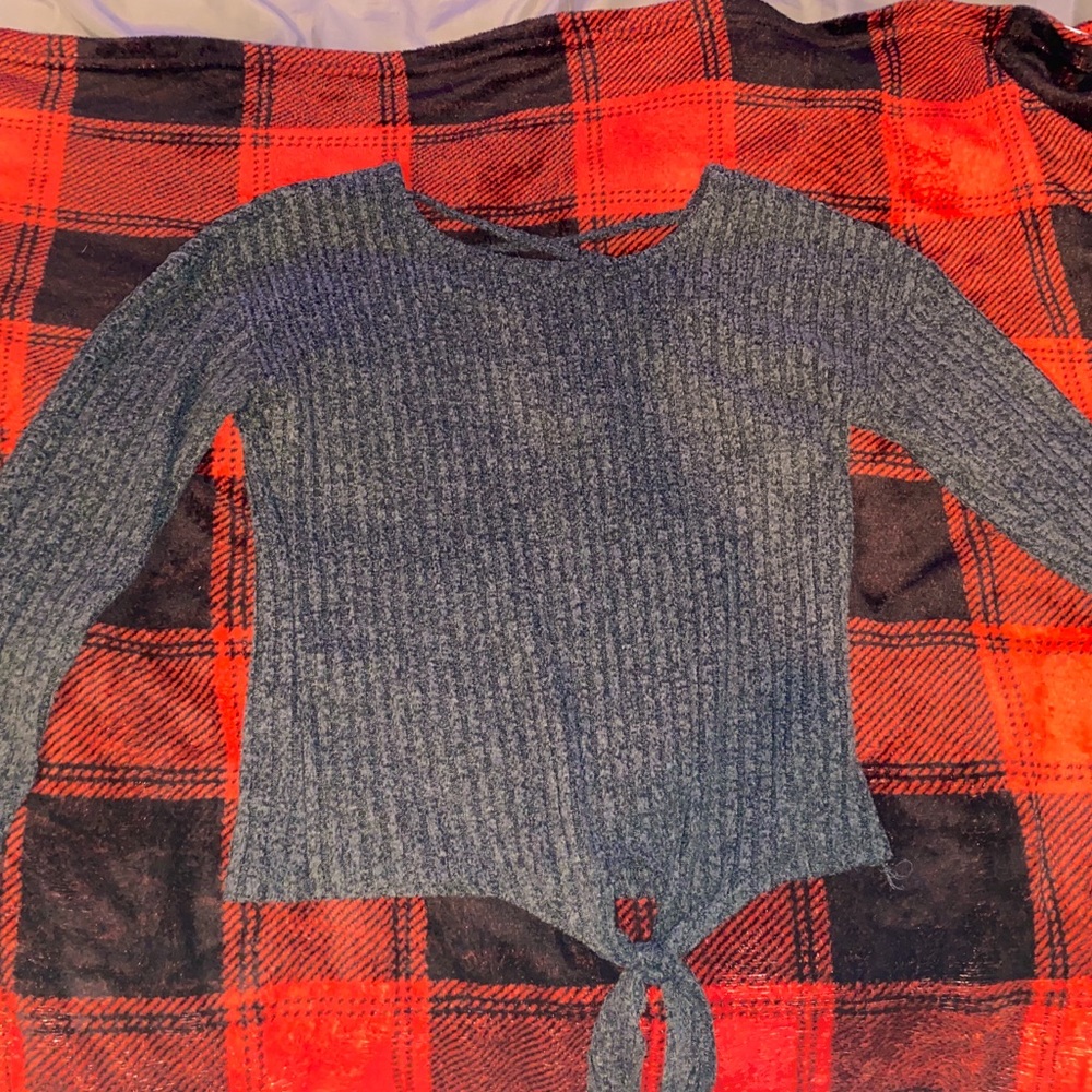 grey long sleeve shirt with a crossover back